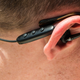 The controller basically disappears when you hide it behind your ear. I can still wear my glasses comfortably, too.